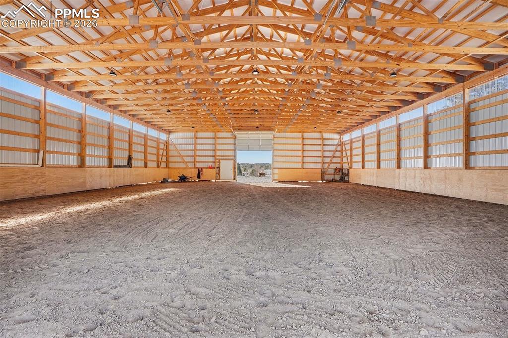 8265 Tannenbaum Road Colorado Springs, CO 80908 - Photo 34 of 50 a view of an empty room with a empty space and windows