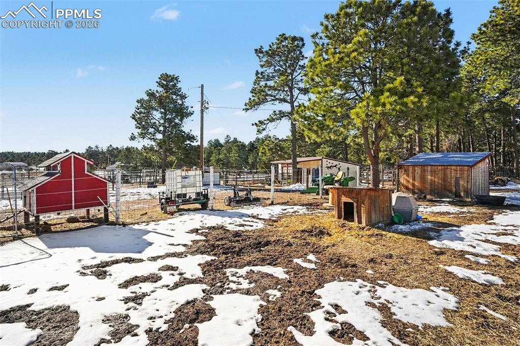 8265 Tannenbaum Road Colorado Springs, CO 80908 - Photo 39 of 50 a view of a patio with a patio