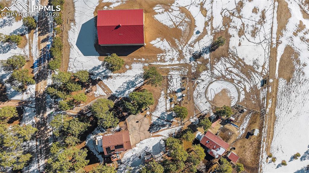 8265 Tannenbaum Road Colorado Springs, CO 80908 - Photo 45 of 50 an aerial view of a house with a yard