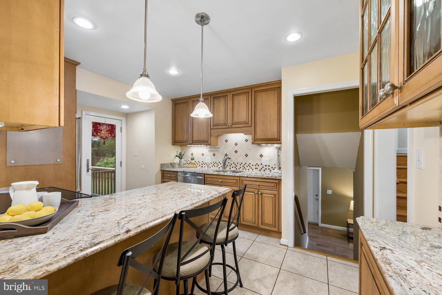 1121 Tanley Road Silver Spring, MD 20904 - Photo 16 of 69 Kitchen with granite breakfast bar