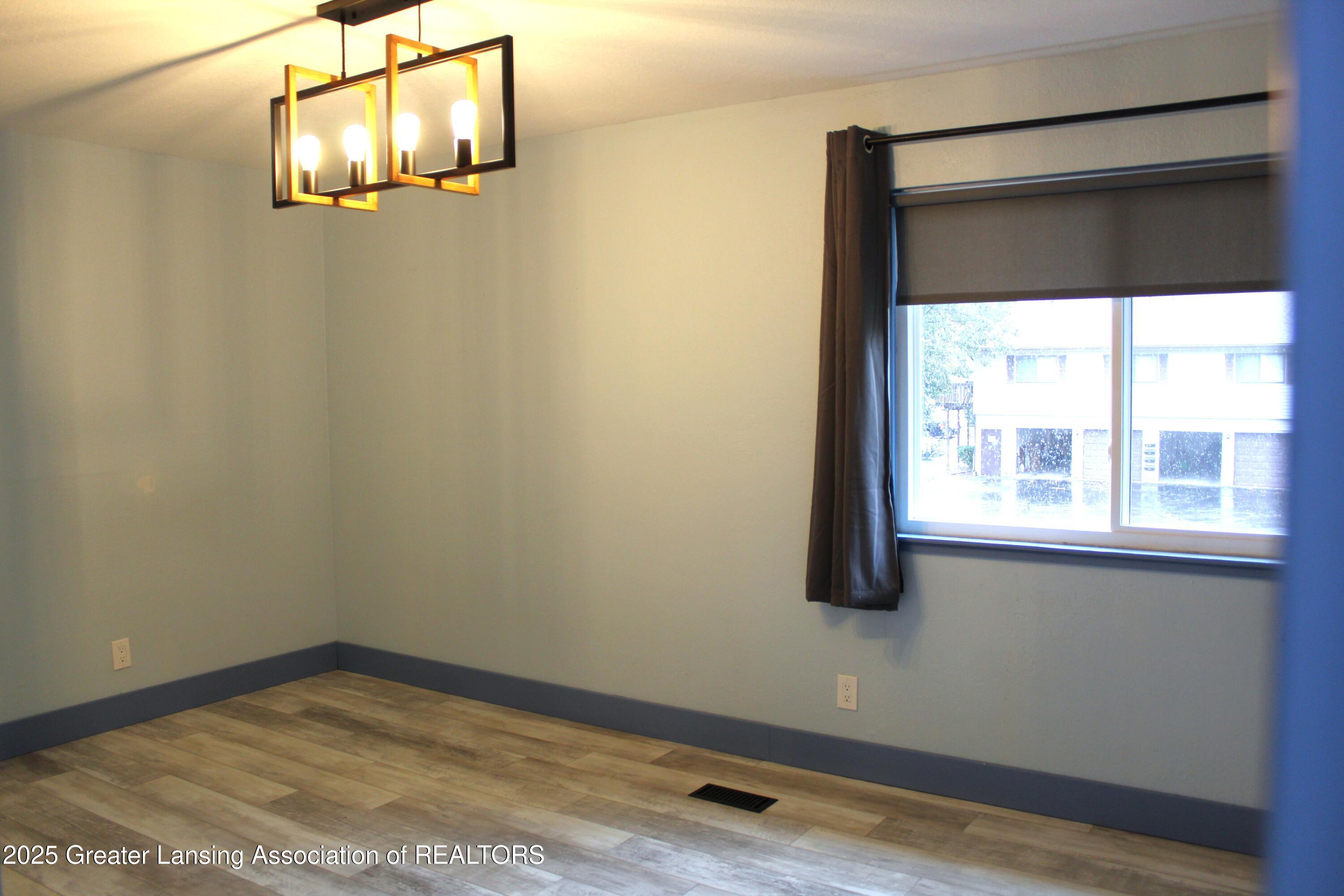 3922 Hunters Ridge Drive, Unit 3 Lansing, MI 48911 - Photo 22 of 44 master bedroom