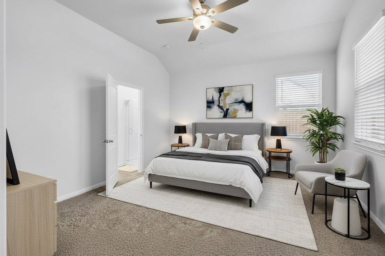 A sneak peek of the primary bedroom! Schedule your tour today! *Virtually staged to show the potential