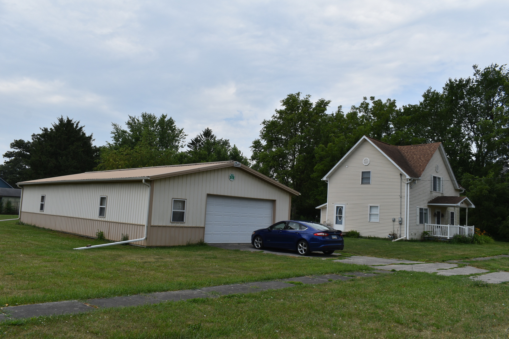208 East Washington Street Dana, IL 61321 - Photo 2 of 28 a view of a house with a yard