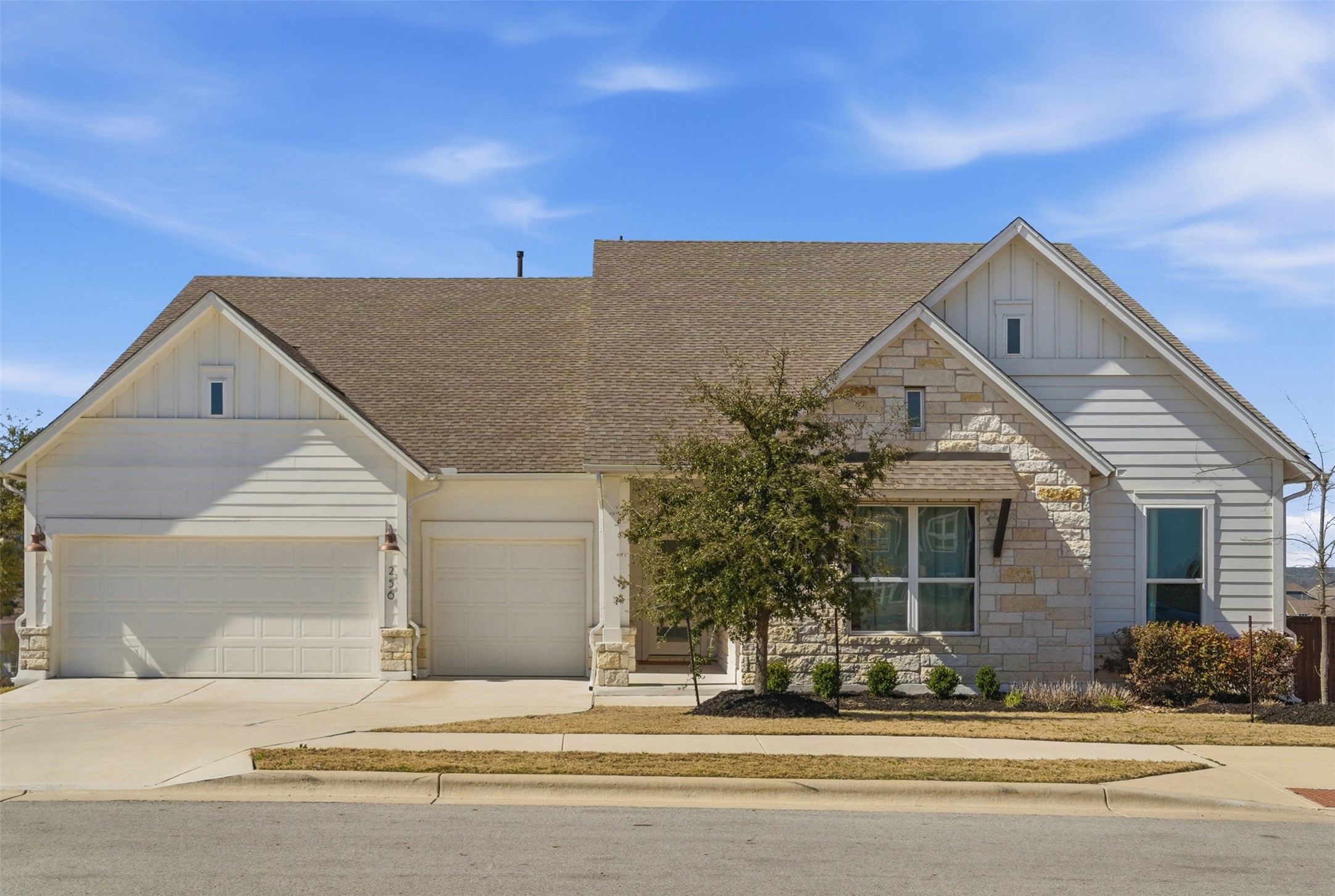 a view of a house with a street