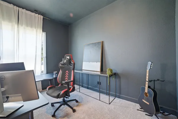 a kitchen that has a cabinets and a table in it