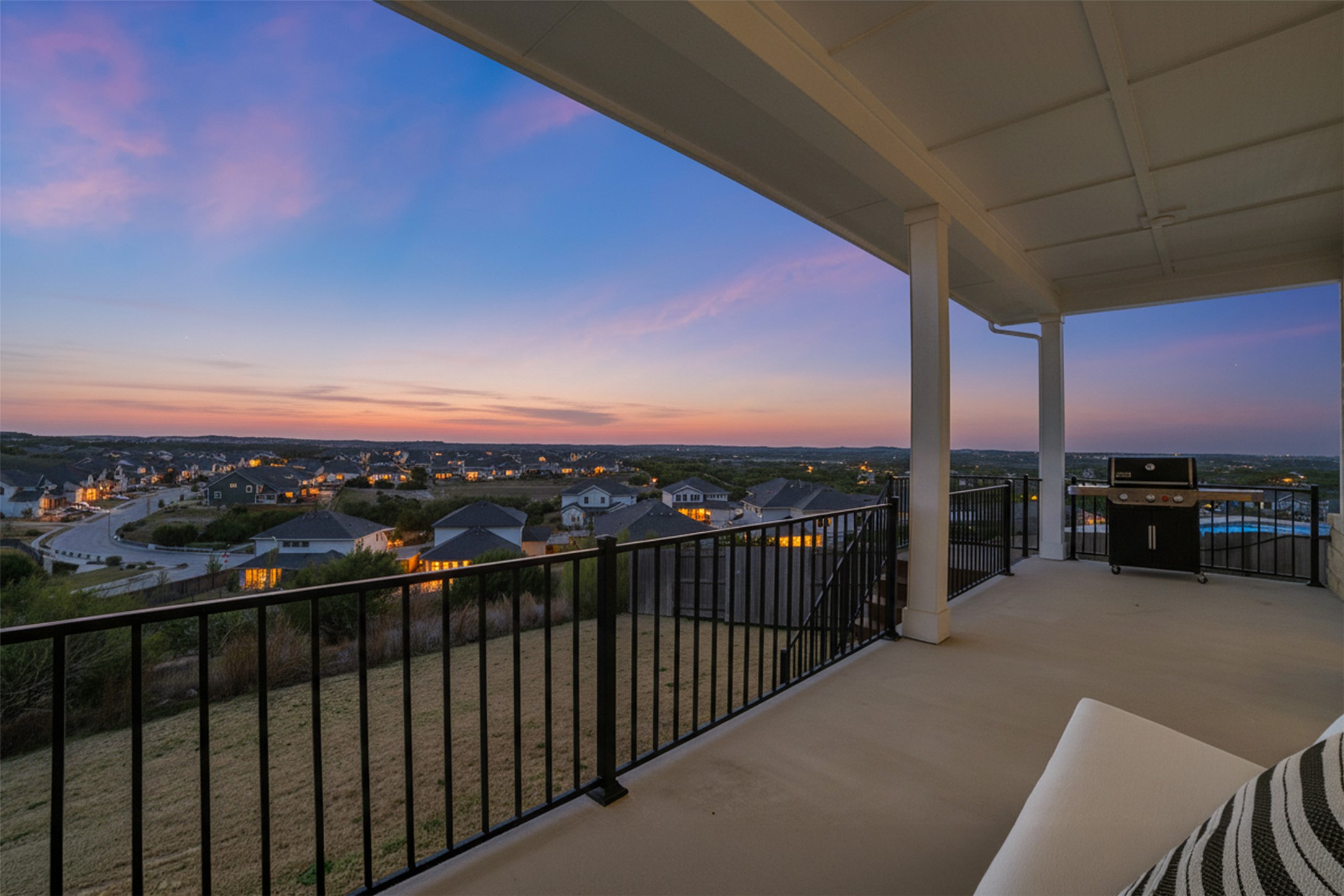 256 Smoke Tree Circle Dripping Springs, TX 78620 - Photo 2 of 40 a view of a balcony with city view