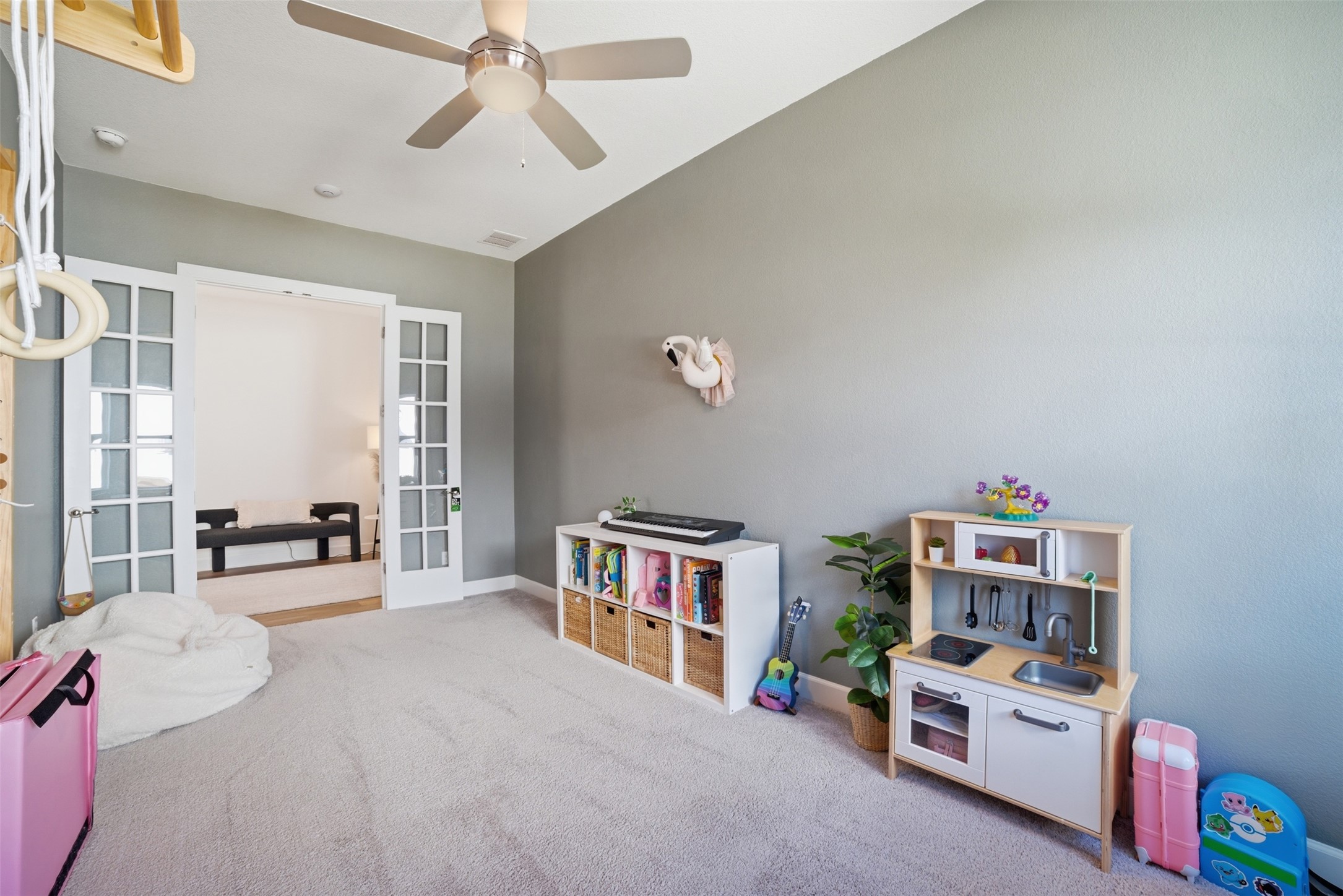 256 Smoke Tree Circle Dripping Springs, TX 78620 - Photo 26 of 40 a room with furniture and a book shelf