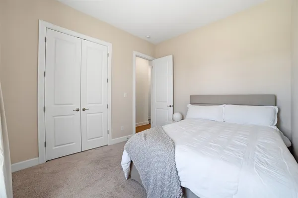 a room with furniture and a book shelf