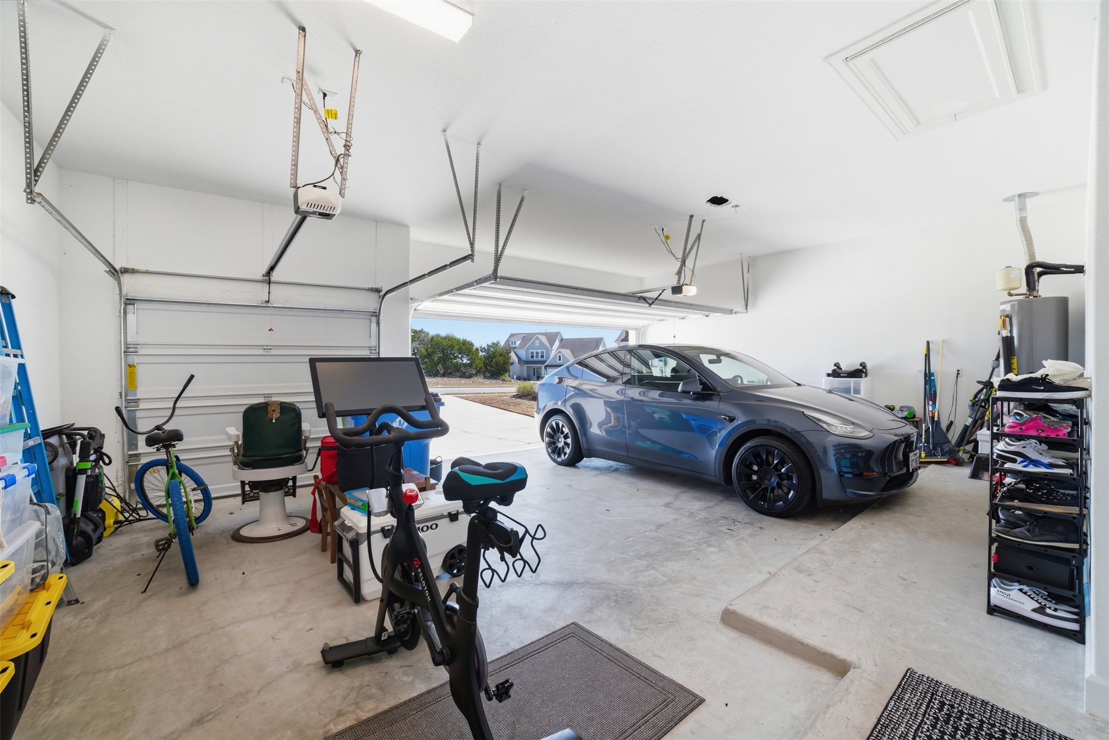 256 Smoke Tree Circle Dripping Springs, TX 78620 - Photo 31 of 40 a view of car garage