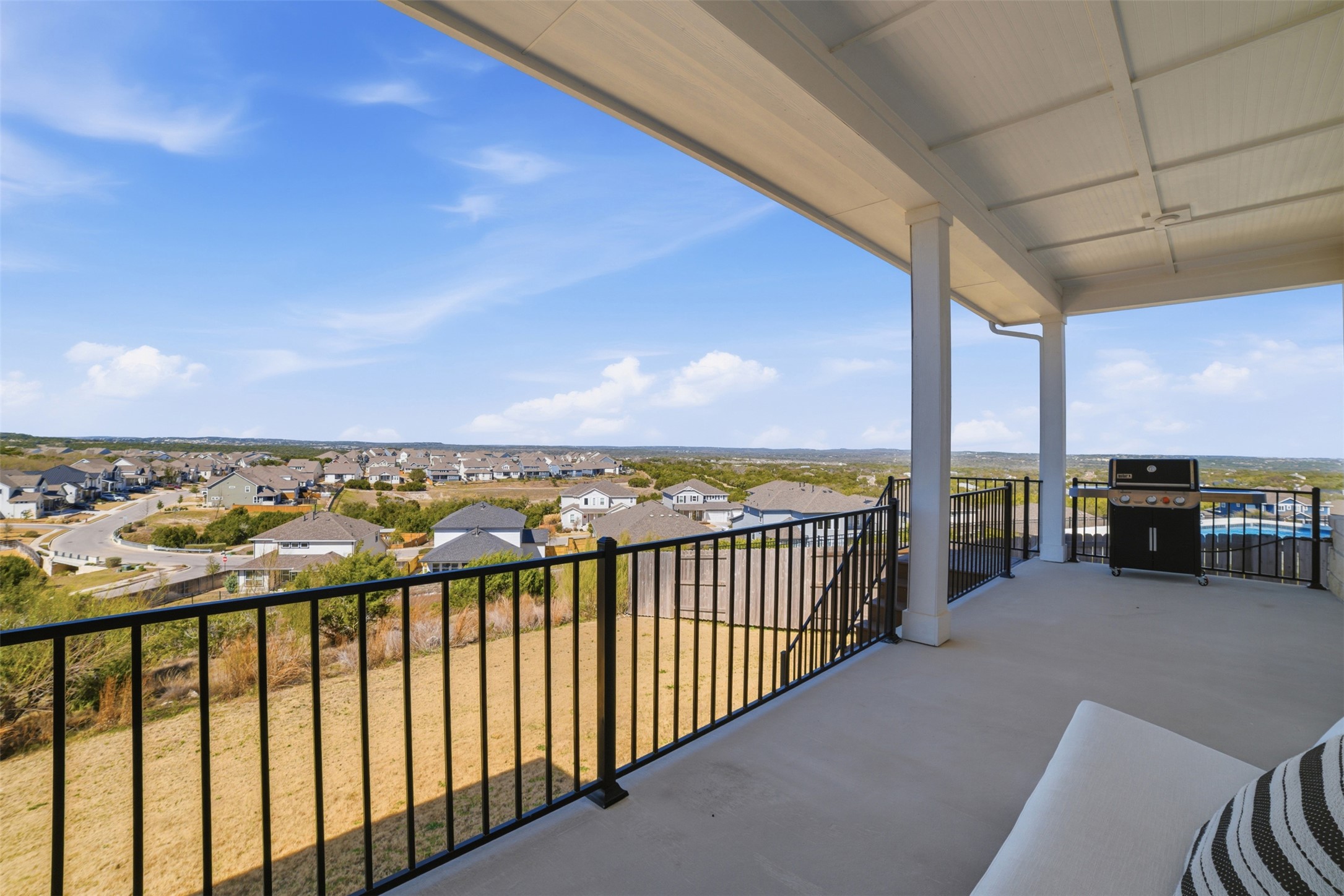 256 Smoke Tree Circle Dripping Springs, TX 78620 - Photo 34 of 40 a view of a balcony with city