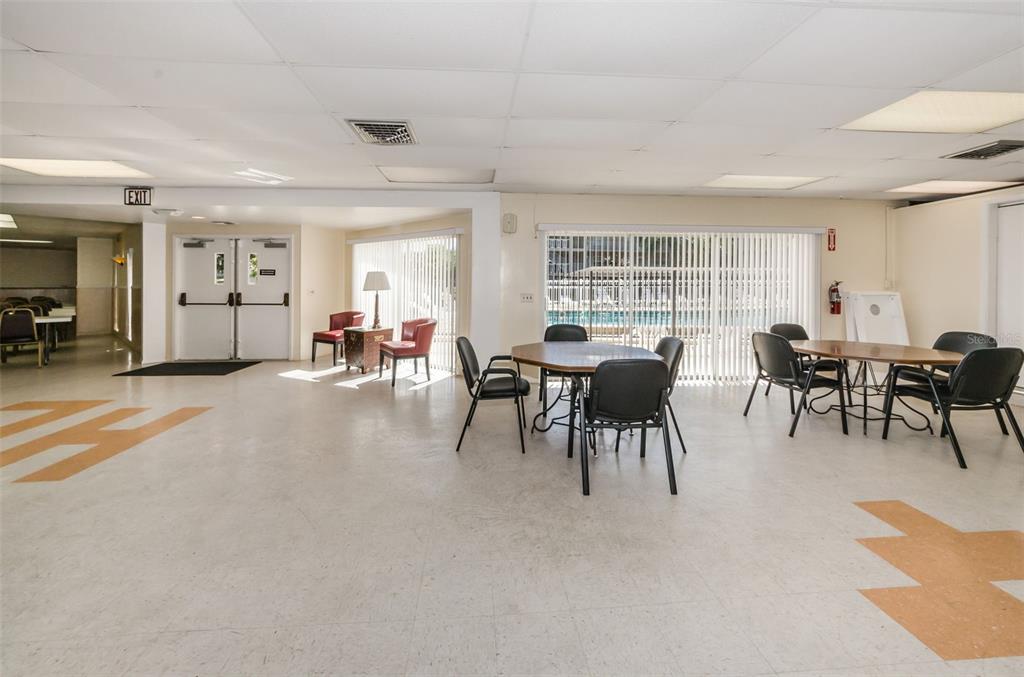 920 Virginia Street, Unit 302 Dunedin, FL 34698 - Photo 53 of 66 a view of a livingroom with furniture window and outside view