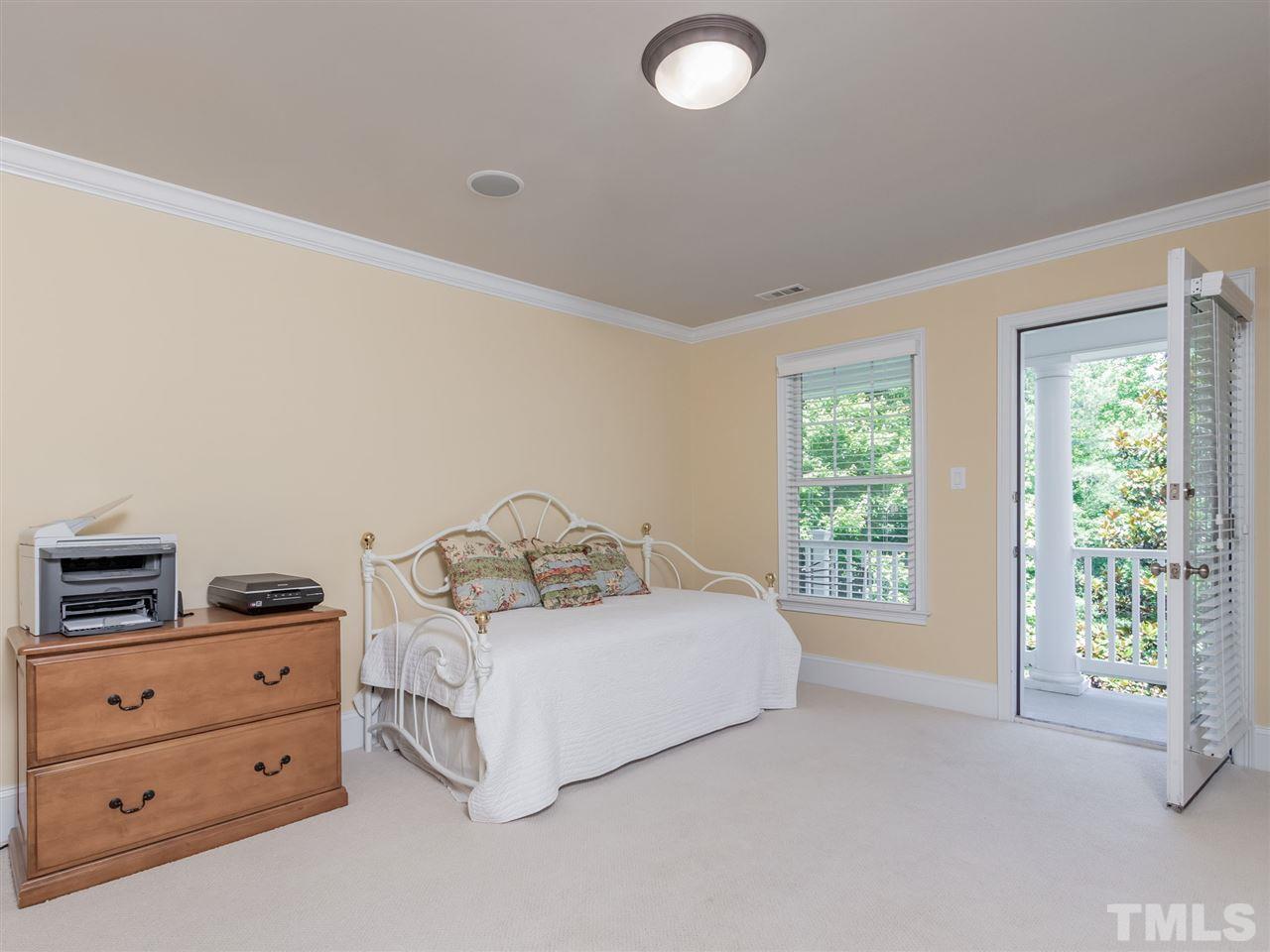 4717 Haleytree Court Raleigh, NC 27606 - Photo 22 of 30 Another spacious second floor bedroom! This one has a balcony!