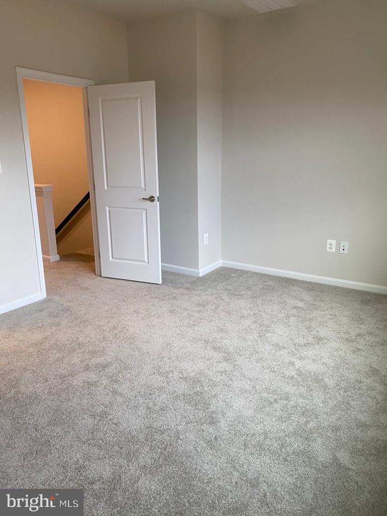 3102 Potters Hill Road Hanover, MD 21076 - Photo 18 of 28 an empty room with an entryway