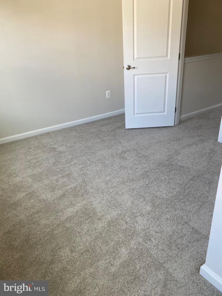 3102 Potters Hill Road Hanover, MD 21076 - Photo 19 of 28 an empty room with closet