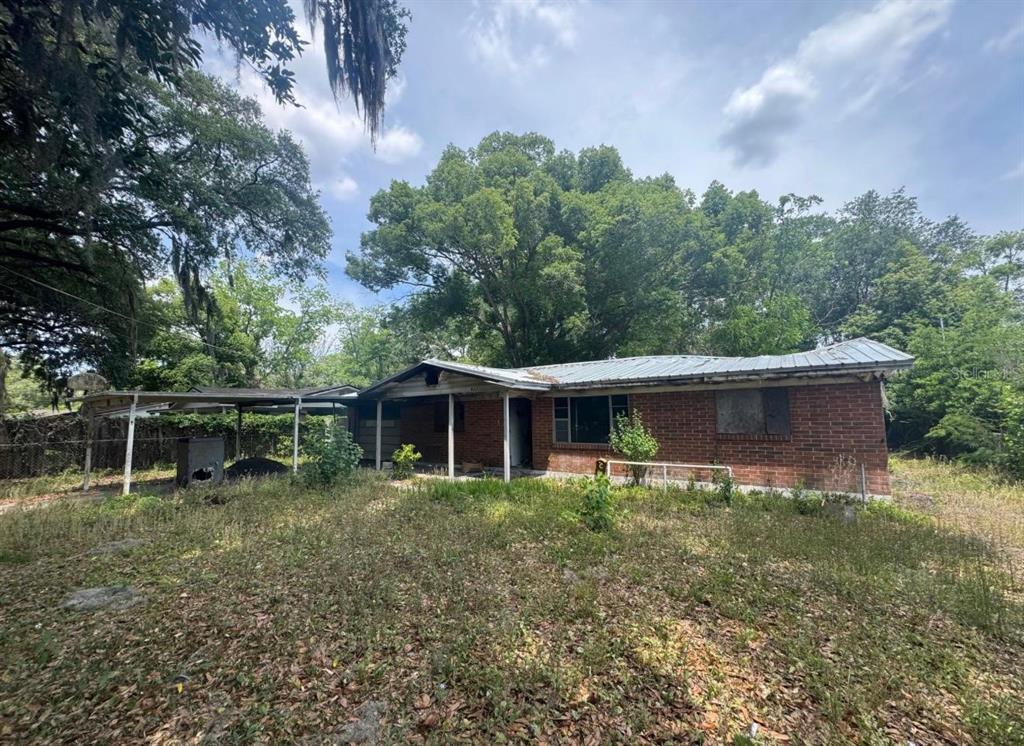 8321 Old Plank Road Jacksonville, FL 32220 - Photo 8 of 8 a view of a house with backyard