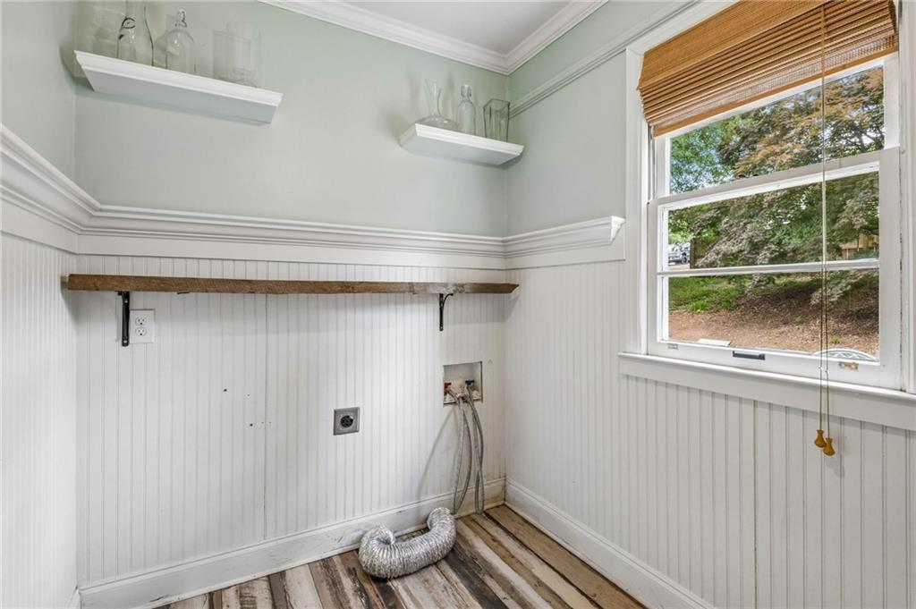 358 Peevy Street Buford, GA 30518 - Photo 15 of 18 a view of small space with racks on the wall