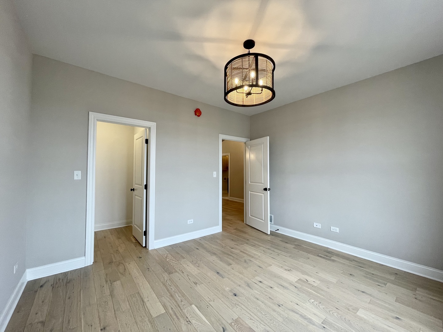 15960 Prairie View, Unit T10 Lockport, IL 60441 - Photo 18 of 29 a view of a room with wooden floor and white walls
