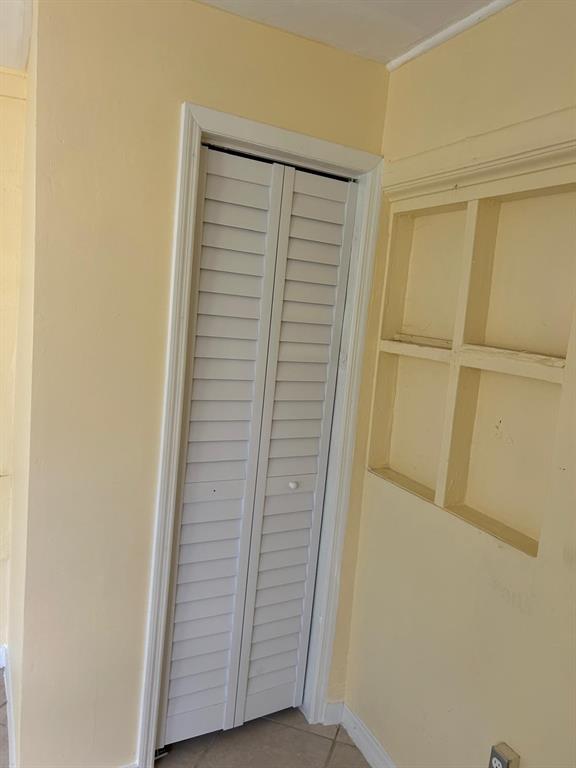 371 Banyan Avenue Pahokee, FL 33476 - Photo 7 of 12 a view of front door with wooden floor