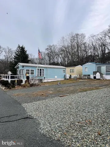 a view of street with parked cars