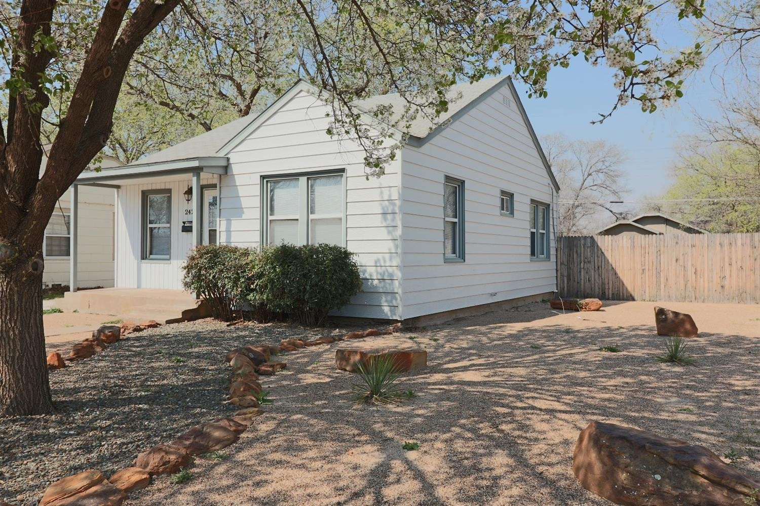2426 26th Street Lubbock, TX 79411 - Photo 2 of 10 a backyard of a house with seating space