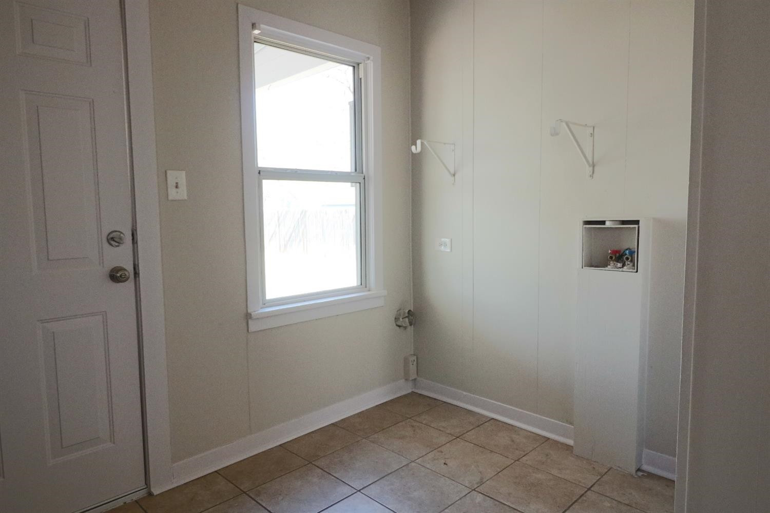 2426 26th Street Lubbock, TX 79411 - Photo 10 of 10 a view of an empty room with a window