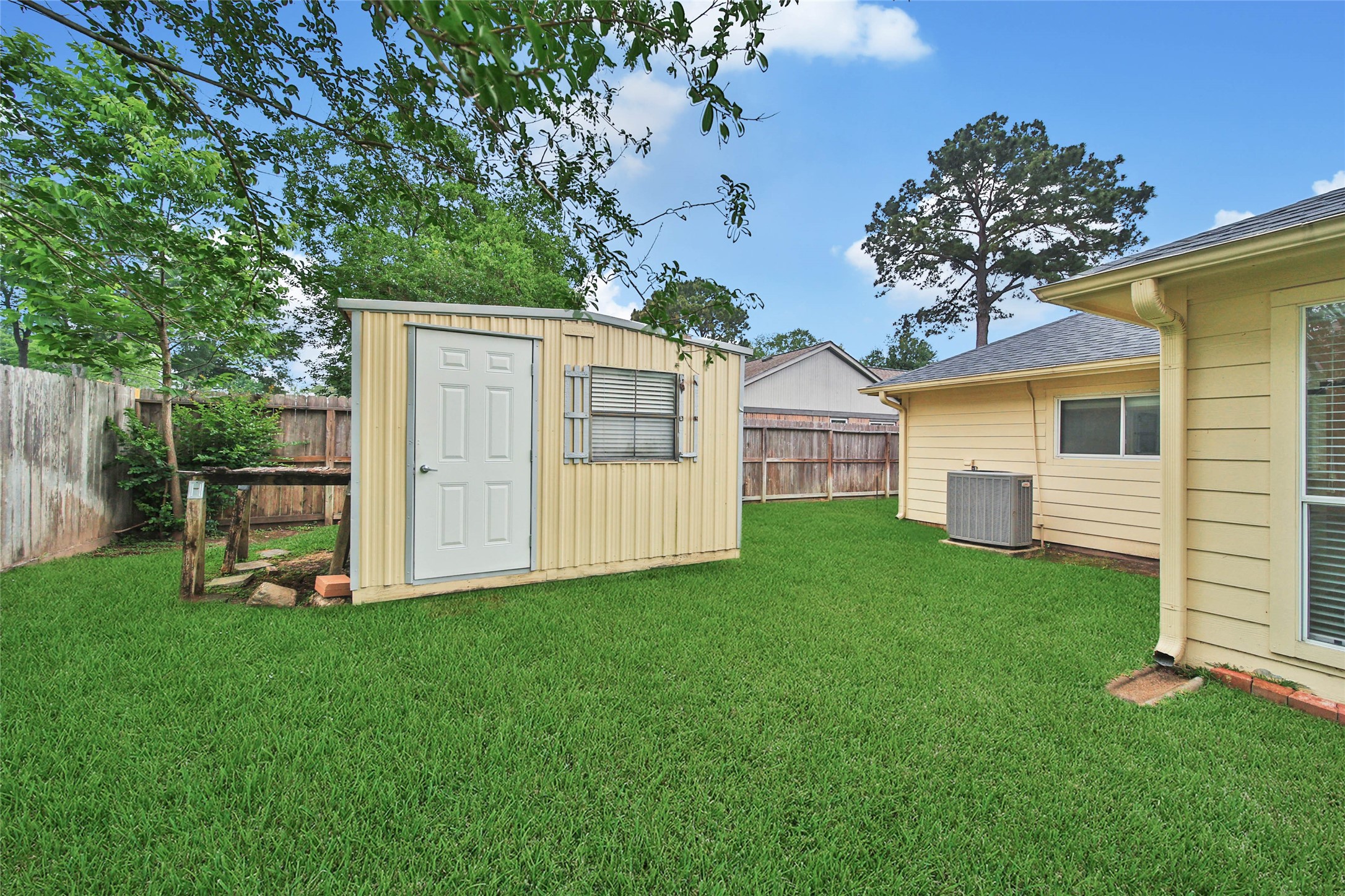 5010 Cupids Bower Court Spring, TX 77388 - Photo 34 of 40 a view of a house with backyard