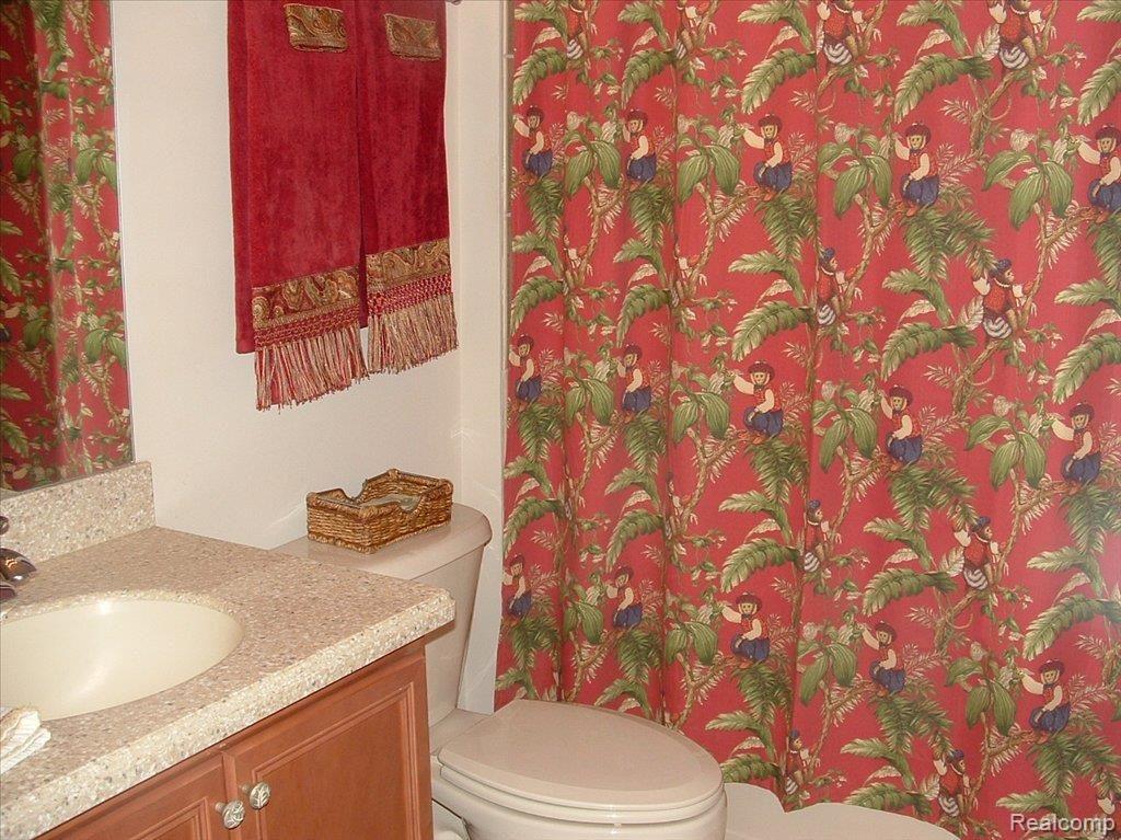24827 Reeds Pointe Drive, Unit 26 Novi, MI 48374 - Photo 12 of 21 Dual sinks in hall bath