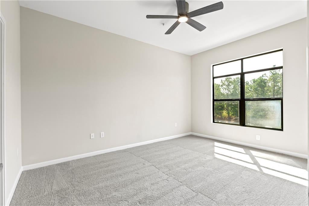 5300 Peachtree Road, Unit 3308 Atlanta, GA 30341 - Photo 14 of 45 a view of an empty room with a window