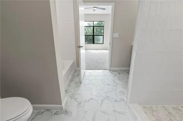 a bathroom with a toilet