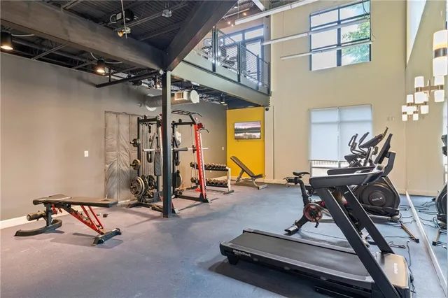 a view of a building with garden and sitting area