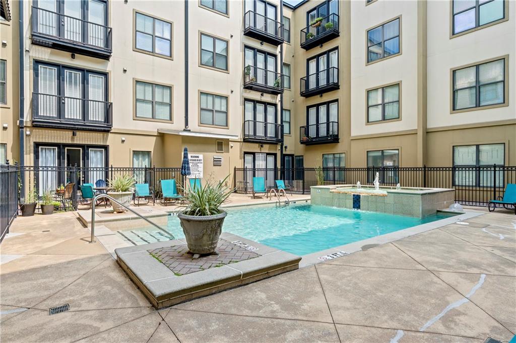 5300 Peachtree Road, Unit 3308 Atlanta, GA 30341 - Photo 40 of 45 a view of a building with garden and sitting area