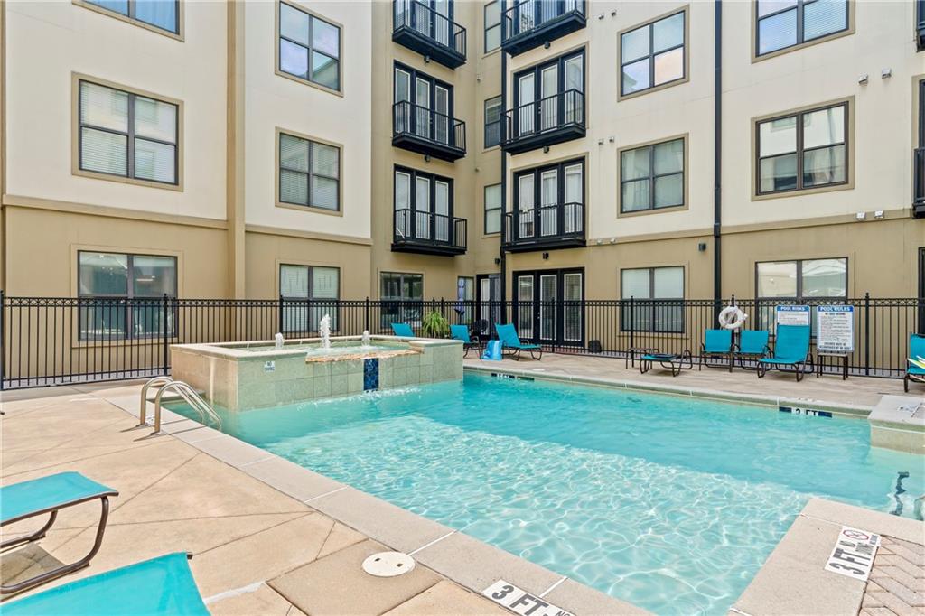 5300 Peachtree Road, Unit 3308 Atlanta, GA 30341 - Photo 41 of 45 a view of a building with a yard