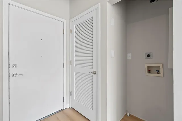a view of a livingroom with wooden floor