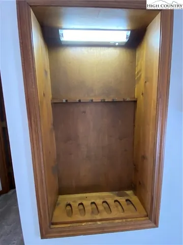 a kitchen with granite countertop a stove cabinets and a counter top space