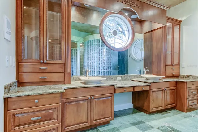 a bathroom with a tub and shower