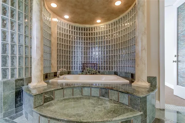 a view of a livingroom with an empty space and a fireplace