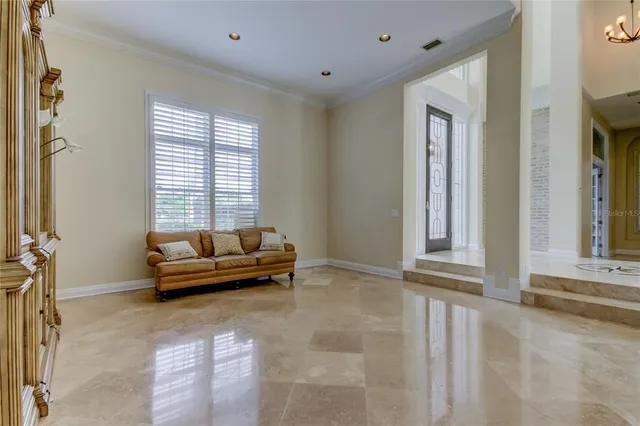 a view of room with walk in closet and window