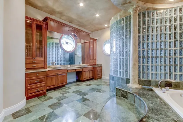 a kitchen with a stove and a sink