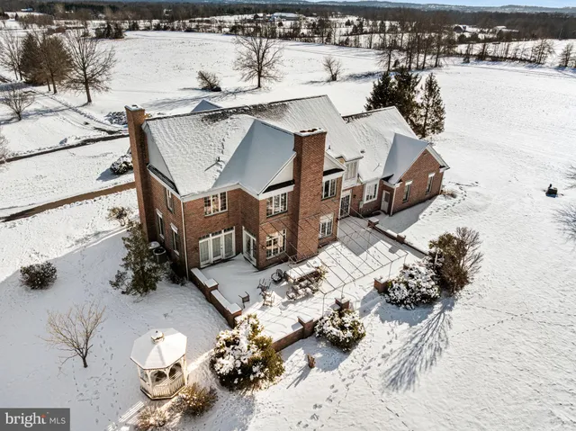 a view of a house with a snow