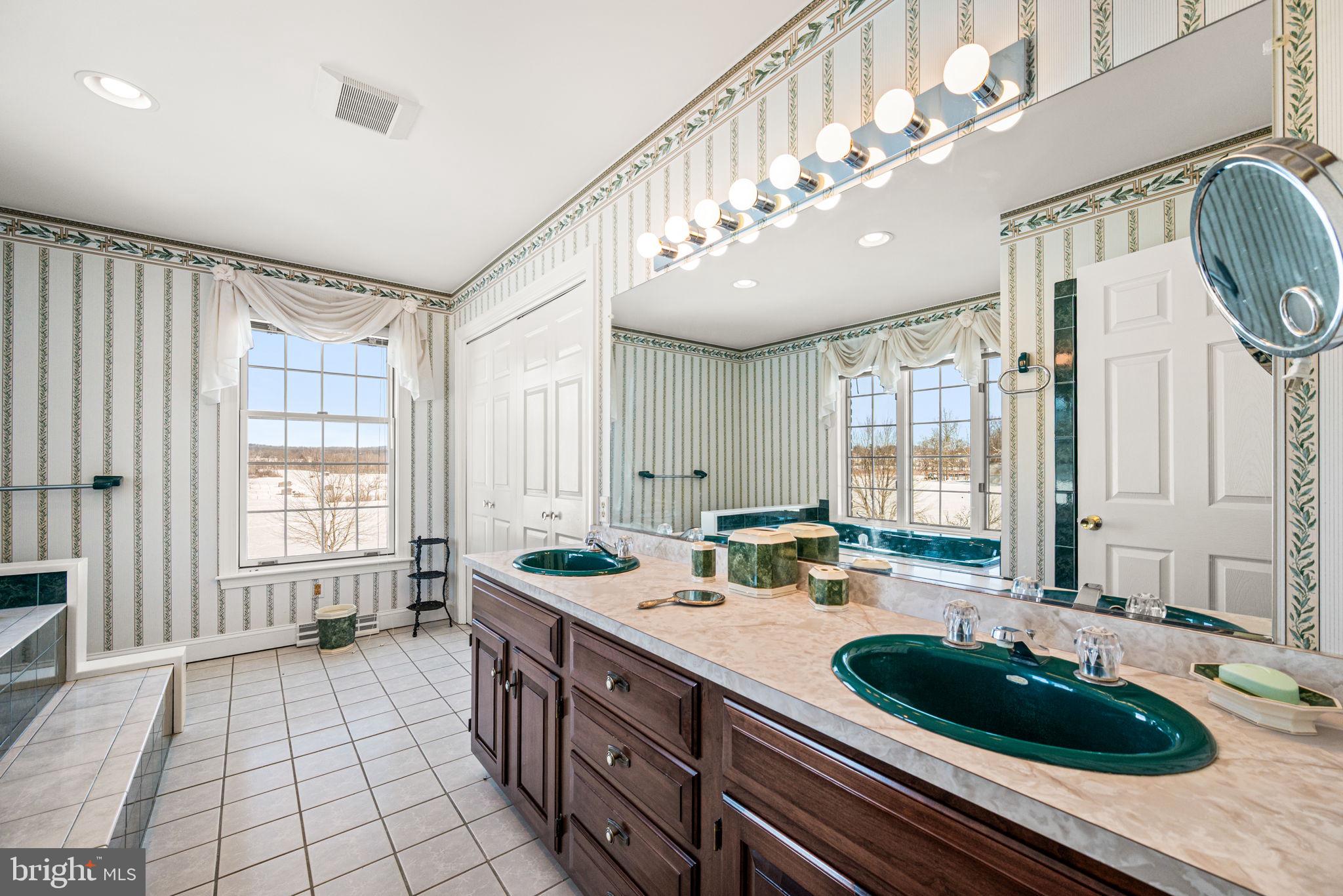 220 Sassamansville Road Gilbertsville, PA 19525 - Photo 22 of 34 a large kitchen with kitchen island a large window and a sink