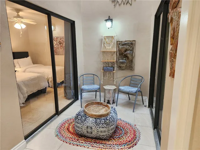 a living room with furniture and a gate