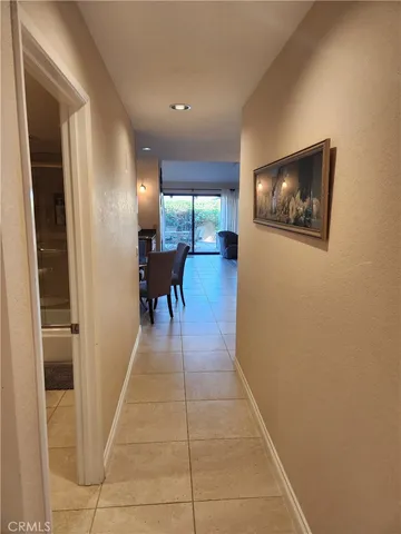 a lobby with furniture and a window