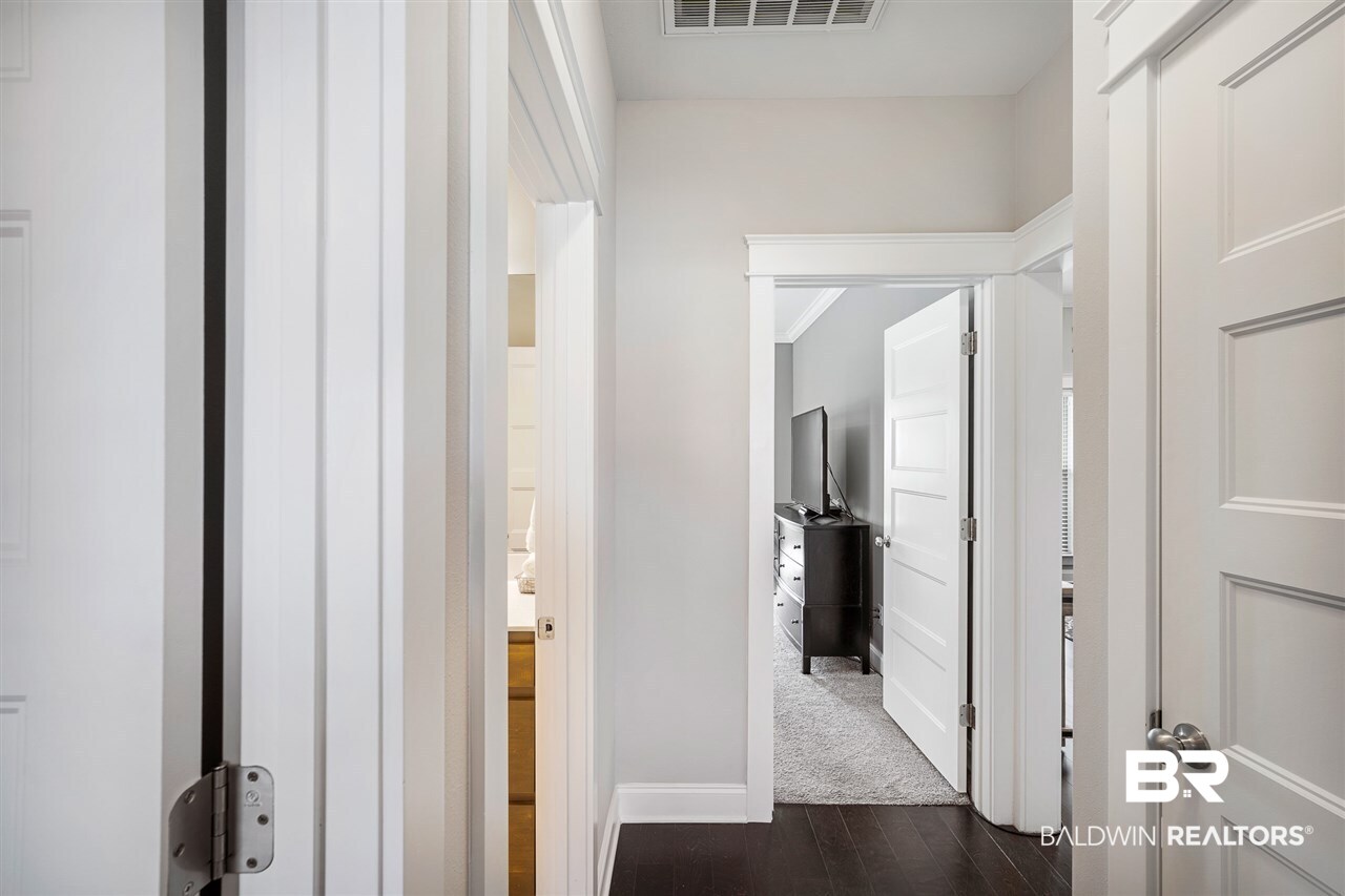 8687 Rosedown Lane Daphne, AL 36526 - Photo 17 of 27 Hallway to Master Bedroom