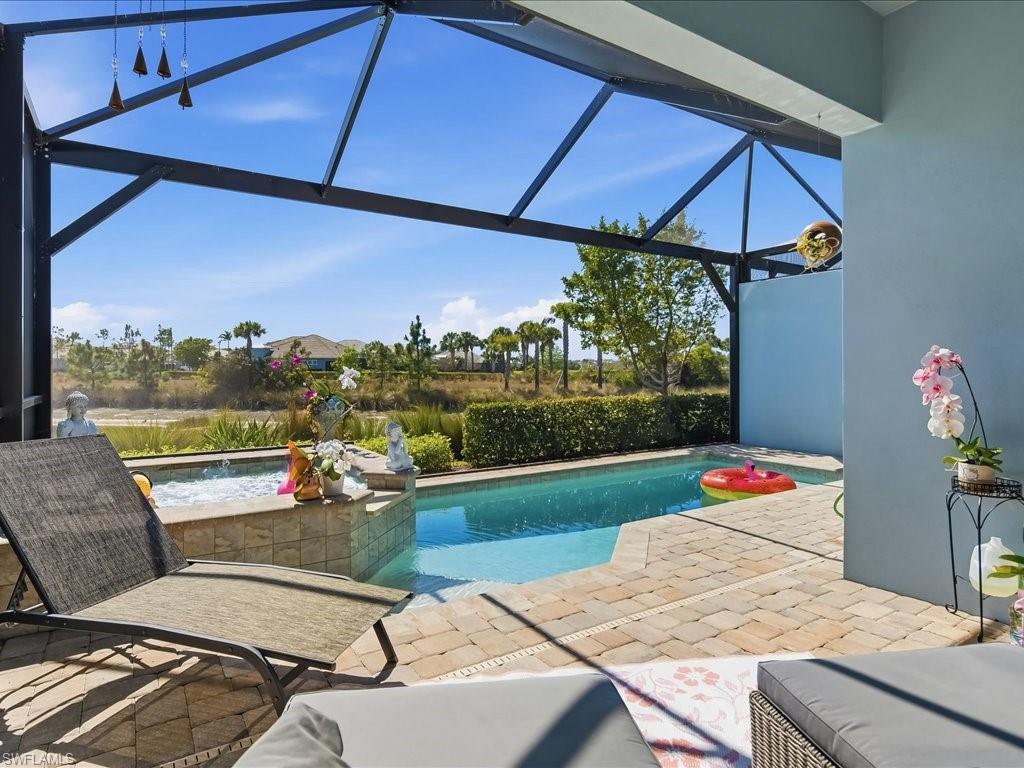 6827 Saona Court Naples, FL 34113 - Photo 18 of 36 a outdoor space with furniture