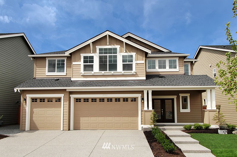 3731 226th Place Southeast Bothell, WA 98021 - Photo 1 of 16 a front view of a house with a yard
