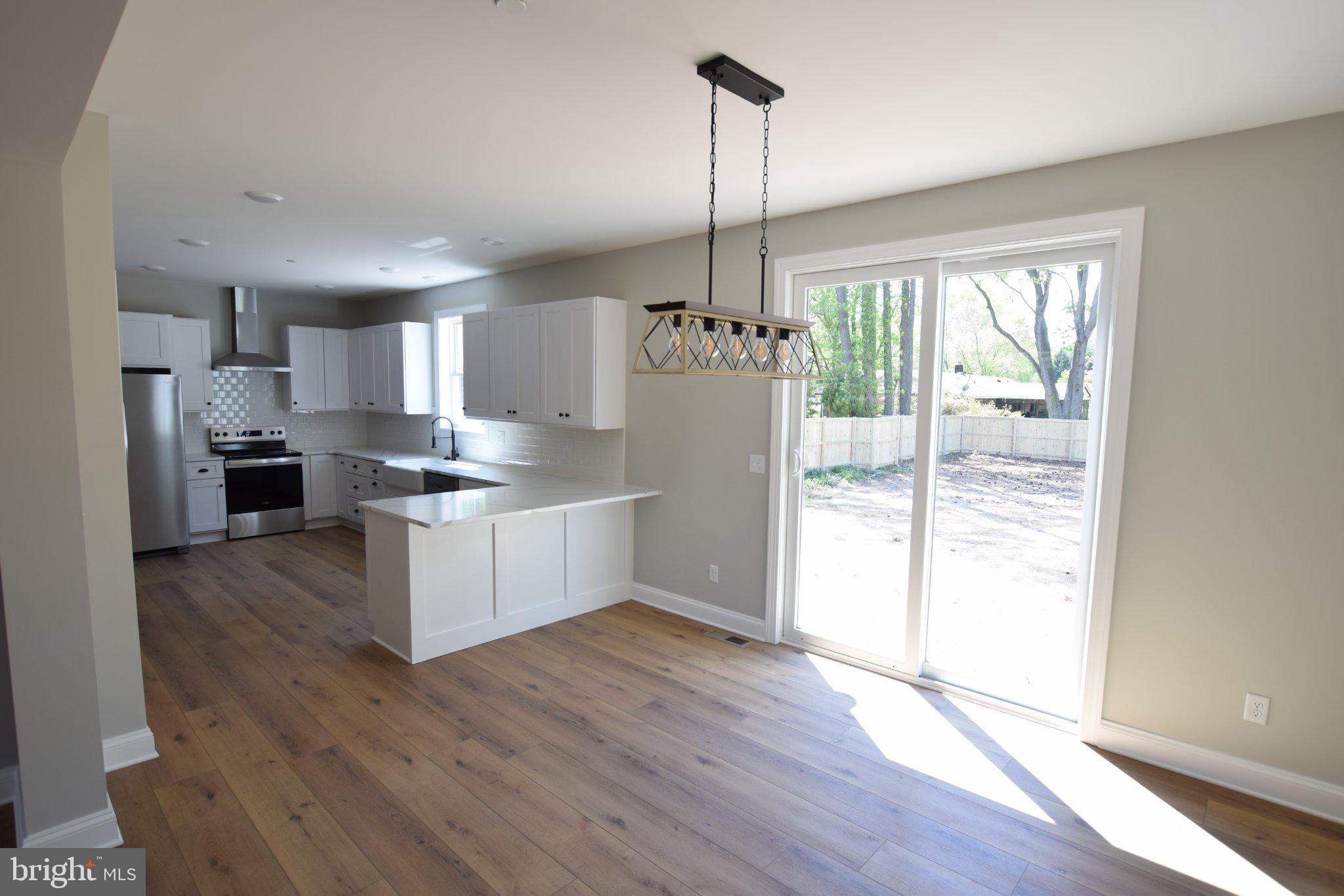 230 Long Point Road Stevensville, MD 21666 - Photo 11 of 41 Bright and airy open kitchen space.