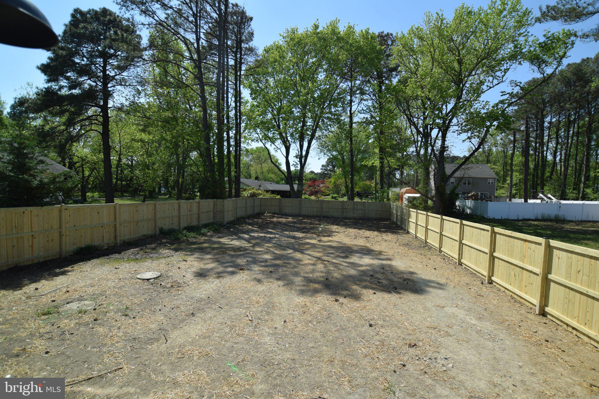 230 Long Point Road Stevensville, MD 21666 - Photo 17 of 41 Spacious, fenced yard ready for dreams.