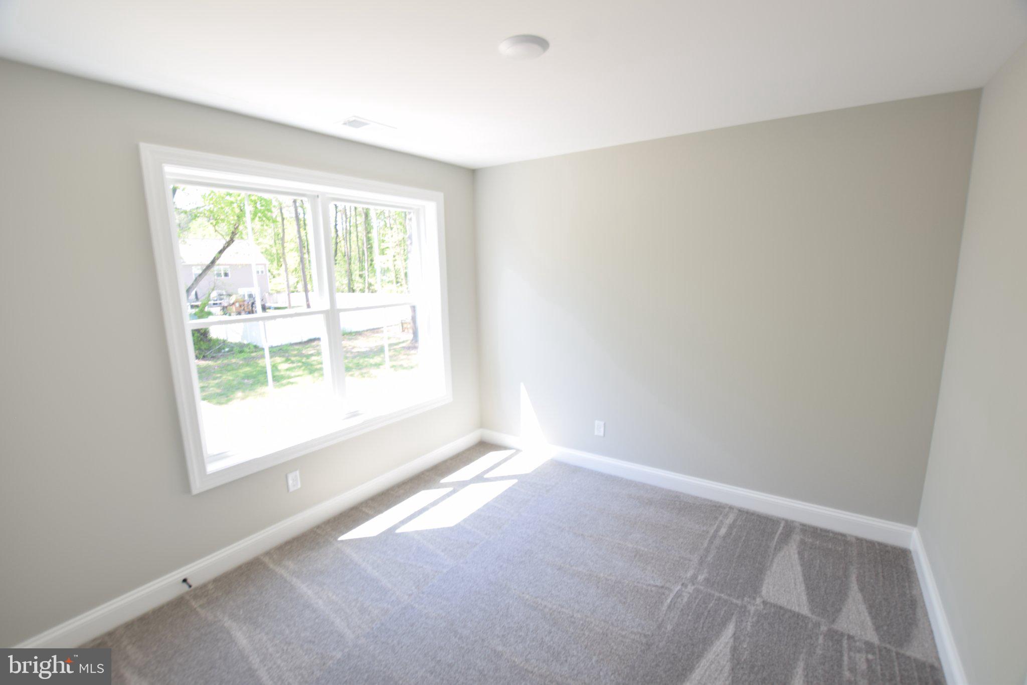 230 Long Point Road Stevensville, MD 21666 - Photo 20 of 41 Bright and airy room with nature views.