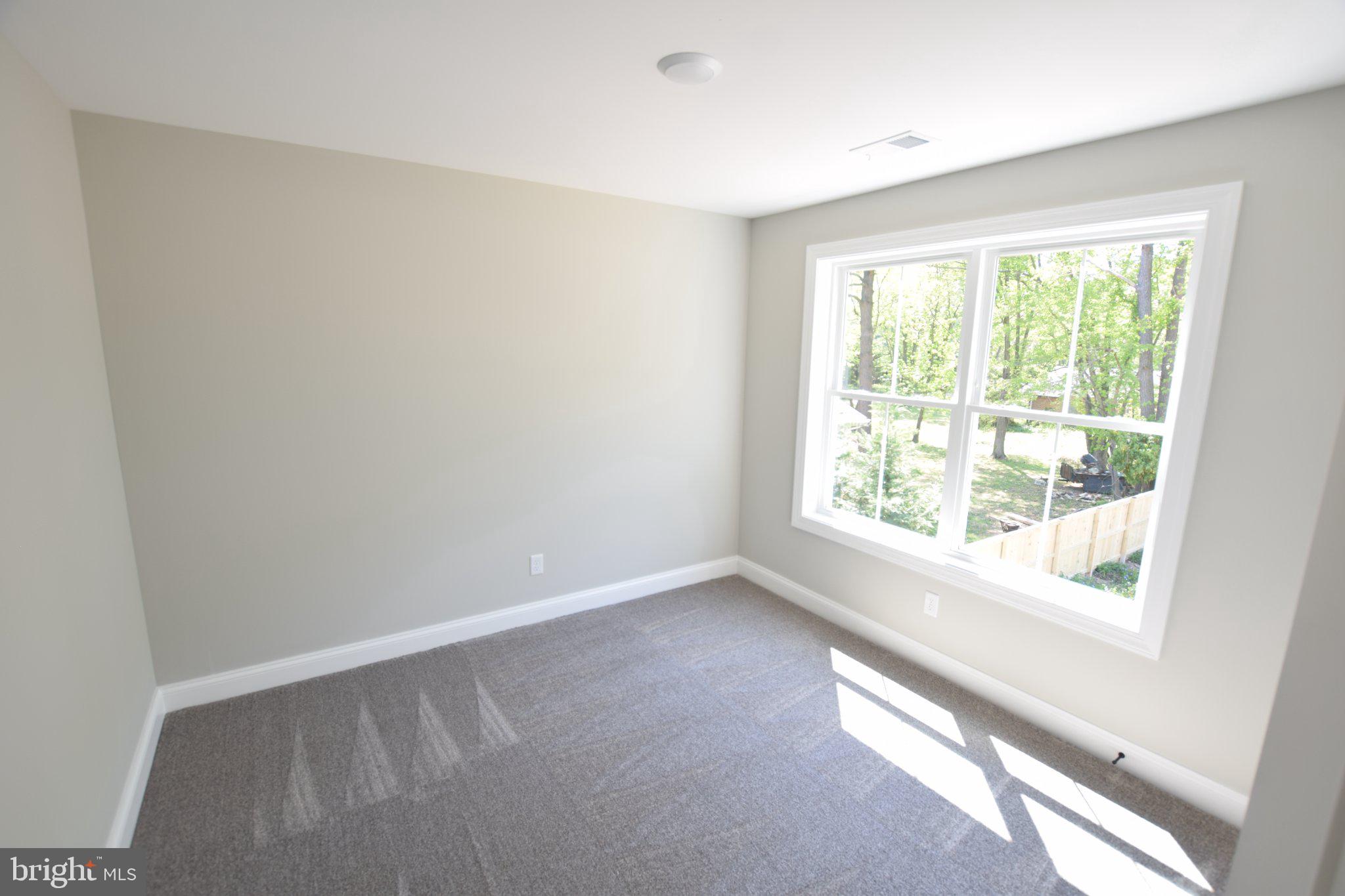230 Long Point Road Stevensville, MD 21666 - Photo 23 of 41 Bright and airy room with nature views.