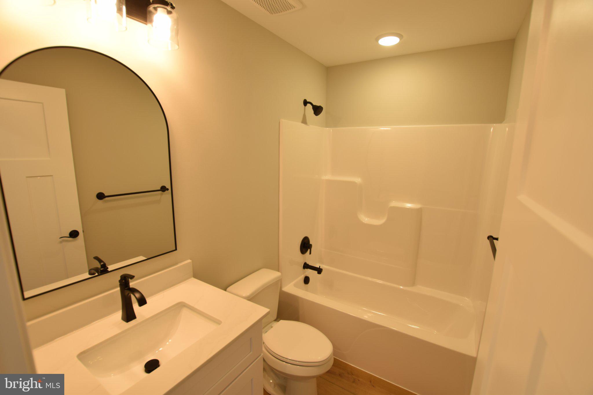 230 Long Point Road Stevensville, MD 21666 - Photo 24 of 41 Modern bathroom with sleek finishes.